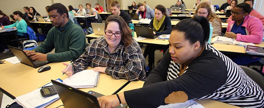 students working together in USA Baldwin County Campus class